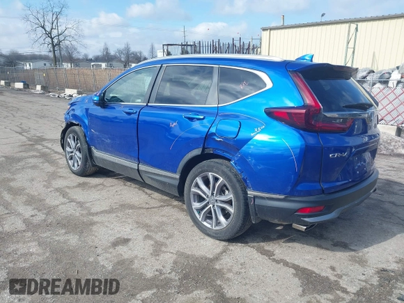 2020 Honda CR-V Touring with VIN 7FARW2H91LE012284, listed as a IAAI auction lot 41672460 with 28,207 mi miles and . Bid and sale history available at DreamBid. Image 3.