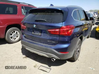 2018 BMW X1 sDrive28i with VIN WBXHU7C33J5L06428, listed as a Copart auction lot 48210333 with 33,965 mi miles. Bid and sale history available at carsss.com. Image 3.