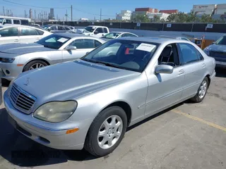 2002 Mercedes-Benz S-Class 5.0L with VIN WDBNG75J52A312063, listed as a IAAI auction lot 41818901 with 191,729 mi miles. Bid and sale history available at carsss.com. Image 2.