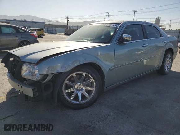 2006 Chrysler 300 C z VIN 2C3LA63H66H408557, wystawiony jako Copart lot #57797005 z przebiegiem 71 932 mil mil oraz Szkoda całkowita • Salvage title. Historia ofert i sprzedaży dostępna na DreamBid. Obrazek 1.