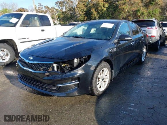 2016 Kia Optima LX z VIN 5XXGT4L30GG076989, wystawiony jako IAAI lot #41835878 z przebiegiem 150 567 mil mil oraz . Historia ofert i sprzedaży dostępna na DreamBid. Obrazek 17.