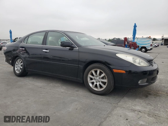 2002 Lexus ES 300 with VIN JTHBF30G520049637, listed as a Copart auction lot 58235085 with 123,290 mi miles and Salvage title. Bid and sale history available at DreamBid. Image 4.