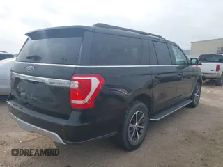 2021 Ford Expedition Max XLT with VIN 1FMJK1JT0MEA18953, listed as a IAAI auction lot 41801066 with 89,986 mi miles and . Bid and sale history available at DreamBid. Image 4.