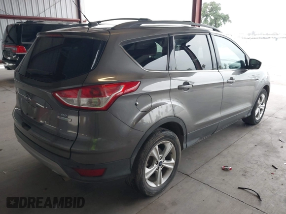 2014 Ford Escape SE with VIN 1FMCU0GXXEUC46554, listed as a IAAI auction lot 42057795 with 92,147 mi miles. Bid and sale history available at carsss.com. Image 4.