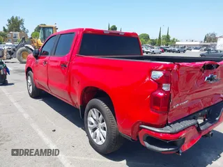 2025 Chevrolet Silverado 1500 Custom with VIN 1GCPABEK2SZ132029, listed as a IAAI auction lot 42279571 with 2,458 mi miles and . Bid and sale history available at DreamBid. Image 3.