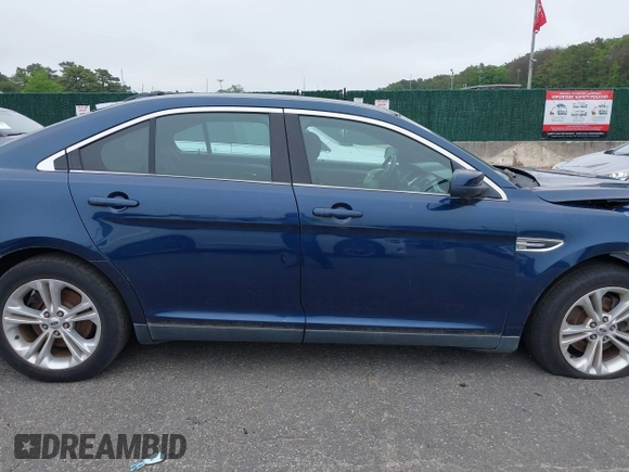 2016 Ford Taurus SEL z VIN 1FAHP2E81GG111690, wystawiony jako IAAI lot #42461206 z przebiegiem 92 424 mil mil oraz . Historia ofert i sprzedaży dostępna na DreamBid. Obrazek 14.
