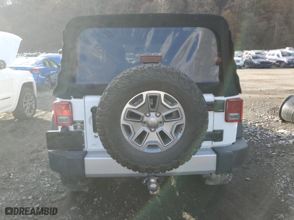 2015 Jeep Wrangler Unlimited Sport with VIN 1C4BJWDG4FL614332, listed as a Copart auction lot 79610274 with 25,524 mi miles and Salvage Title. Bid and sale history available at carsss.com. Image 6.