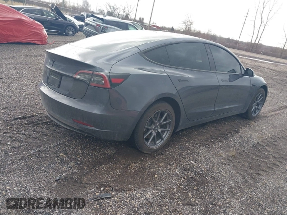 2023 Tesla Model 3 with VIN 5YJ3E1EAXPF693693, listed as a IAAI auction lot 41709704 with 12,473 mi miles and . Bid and sale history available at DreamBid. Image 4.