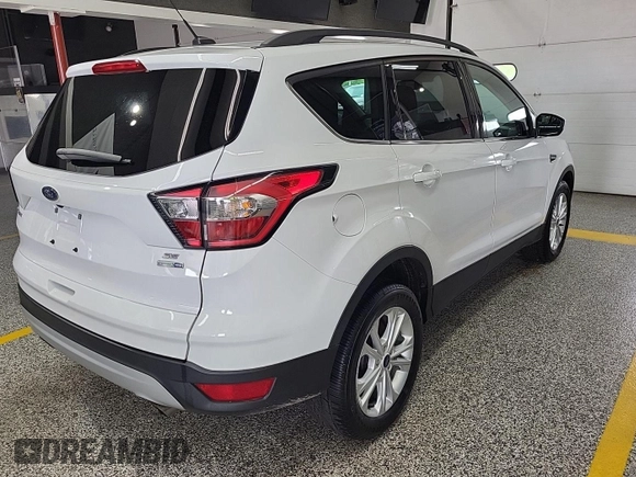 2018 Ford Escape SE z VIN 1FMCU9GD3JUC89119, wystawiony jako IAAI lot #42421139 z przebiegiem 42 209 mil mil oraz . Historia ofert i sprzedaży dostępna na DreamBid. Obrazek 15.