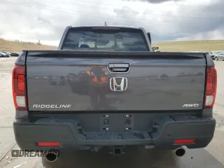2023 Honda Ridgeline RTL-E with VIN 5FPYK3F78PB010961, listed as a Copart auction lot 51458635 with 33,508 mi miles and Salvage title. Bid and sale history available at DreamBid. Image 6.