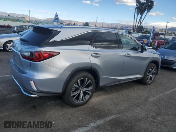 2022 Lexus RX with VIN JTJHZKEA0N2024877, listed as a Copart auction lot 41654965 with 14,003 mi miles and Salvage Title. Bid and sale history available at carsss.com. Image 3.