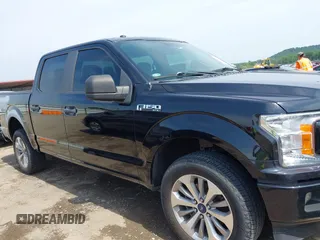 2018 Ford F-150 XL with VIN 1FTEW1EP1JKD05142, listed as a IAAI auction lot 42473177 with 99,079 mi miles and . Bid and sale history available at DreamBid. Image 14.
