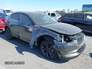 2024 Mazda CX-30 S Select Sport with VIN 3MVDMBBM8RM716638, listed as a IAAI auction lot 42390486 with 4,098 mi miles and . Bid and sale history available at DreamBid. Image 1.