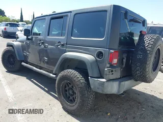 2016 Jeep Wrangler Unlimited Sport z VIN 1C4BJWDG7GL229364, wystawiony jako IAAI lot #42239069 z przebiegiem 87 001 mil mil oraz . Historia ofert i sprzedaży dostępna na DreamBid. Obrazek 3.