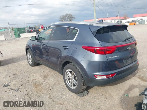 2018 Kia Sportage LX with VIN KNDPMCAC9J7363466, listed as a IAAI auction lot 41841061 with 98,154 mi miles and . Bid and sale history available at DreamBid. Image 3.