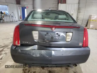 2010 Cadillac STS AWD z VIN 1G6DU6EV5A0113671, wystawiony jako Copart lot #47447395 z przebiegiem 77 062 mil mil oraz Tytuł czysty. Historia ofert i sprzedaży dostępna na DreamBid. Obrazek 6.