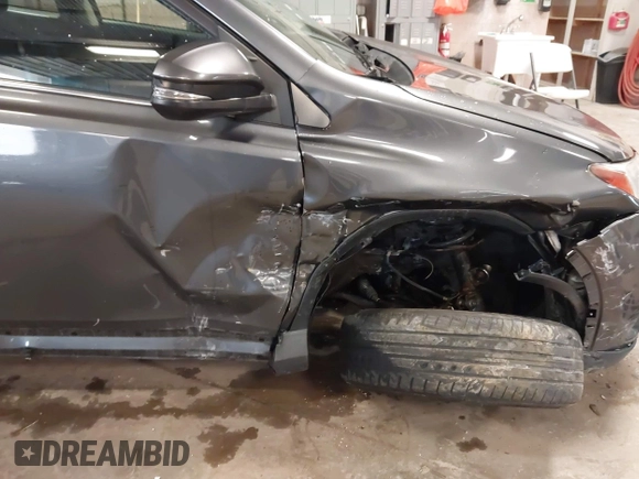 2018 Toyota RAV4 XLE with VIN 2T3RFREVXJW788412, listed as a IAAI auction lot 41931142 with 119,962 mi miles. Bid and sale history available at carsss.com. Image 6.