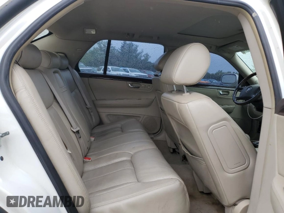 2008 Cadillac DTS 1SA z VIN 1G6KD57Y48U178829, wystawiony jako Copart lot #56669235 z przebiegiem 118 380 mil mil oraz Szkoda całkowita • Salvage title. Historia ofert i sprzedaży dostępna na DreamBid. Obrazek 10.