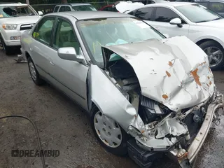 1999 Honda Accord LX with VIN 1HGCG6659XA079849, listed as a IAAI auction lot 42527511 with 208,772 mi miles and . Bid and sale history available at DreamBid. Image 1.