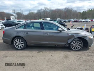 2013 Audi A6 Premium Plus z VIN WAUGGAFC1DN038375, wystawiony jako IAAI lot #42051929 z przebiegiem 118 181 mil mil oraz . Historia ofert i sprzedaży dostępna na DreamBid. Obrazek 13.