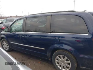 2013 Chrysler Town & Country Touring with VIN 2C4RC1BG9DR670205, listed as a IAAI auction lot 41683764 with 173,145 mi miles. Bid and sale history available at carsss.com. Image 14.