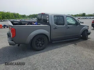 2020 Nissan Frontier SV with VIN 1N6ED0EB2LN723101, listed as a Copart auction lot 57444185 with 74,000 mi miles and Salvage title. Bid and sale history available at DreamBid. Image 3.