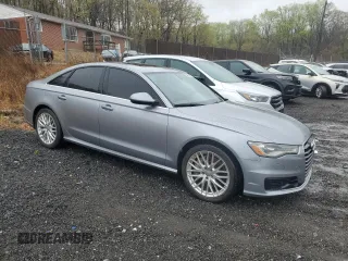 2016 Audi A6 2.0T Premium Plus with VIN WAUGFAFC9GN061619, listed as a Copart auction lot 52921995 with 132,571 mi miles and Clean Title. Bid and sale history available at carsss.com. Image 4.