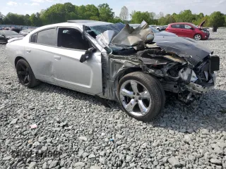 2012 Dodge Charger RT with VIN 2C3CDXCT9CH285351, listed as a Copart auction lot 54021895 with 158,063 mi miles and Salvage Title. Bid and sale history available at DreamBid. Image 4.