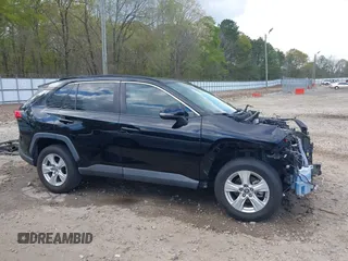 2019 Toyota RAV4 XLE with VIN 2T3W1RFV8KW001328, listed as a IAAI auction lot 41961320 with 100,678 mi miles and . Bid and sale history available at DreamBid. Image 14.