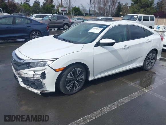 2017 Honda Civic EX-L z VIN 2HGFC1F79HH635156, wystawiony jako IAAI lot #41922115 z przebiegiem 142 565 mil mil oraz . Historia ofert i sprzedaży dostępna na DreamBid. Obrazek 17.