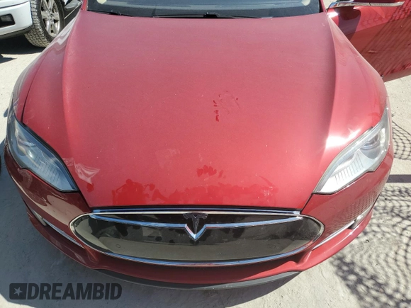 2014 Tesla Model S 60 z VIN 5YJSA1H19EFP27946, wystawiony jako Copart lot #61284625 z przebiegiem 109 147 mil mil oraz Szkoda całkowita • Salvage title. Historia ofert i sprzedaży dostępna na DreamBid. Obrazek 11.