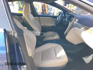 2016 Tesla Model S 90D with VIN 5YJSA1E25GF144614, listed as a IAAI auction lot 40941311 with 83,587 mi miles and . Bid and sale history available at DreamBid. Image 5.