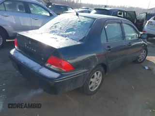 2002 Mitsubishi Lancer LS with VIN JA3AJ36E42U080614, listed as a IAAI auction lot 41397554 with 187,981 mi miles. Bid and sale history available at carsss.com. Image 4.