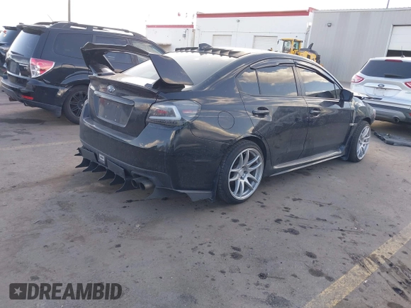 2016 Subaru WRX with VIN JF1VA1B63G9817632, listed as a IAAI auction lot 41818265 with 89,938 mi miles. Bid and sale history available at carsss.com. Image 4.