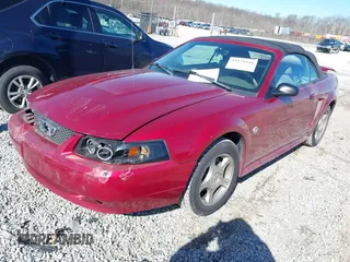2004 Ford Mustang Deluxe with VIN 1FAFP44694F219365, listed as a IAAI auction lot 41628448 with 124,733 mi miles. Bid and sale history available at carsss.com. Image 18.