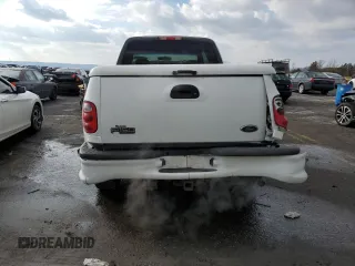 2002 Ford F-150 XL z VIN 2FTRX08L12CA26636, wystawiony jako Copart lot #89254825 z przebiegiem 133 637 mil mil oraz Szkoda całkowita • Salvage title. Historia ofert i sprzedaży dostępna na DreamBid. Obrazek 6.