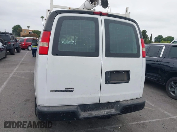2012 Chevrolet Express Cargo z VIN 1GCWGFCA7C1201373, wystawiony jako IAAI lot #42414621 z przebiegiem 181 807 mil mil oraz . Historia ofert i sprzedaży dostępna na DreamBid. Obrazek 16.