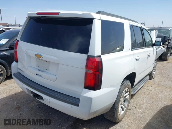 2015 Chevrolet Tahoe LS with VIN 1GNSCAKC3FR687421, listed as a IAAI auction lot 41930895 with Not provided miles and . Bid and sale history available at DreamBid. Image 4.