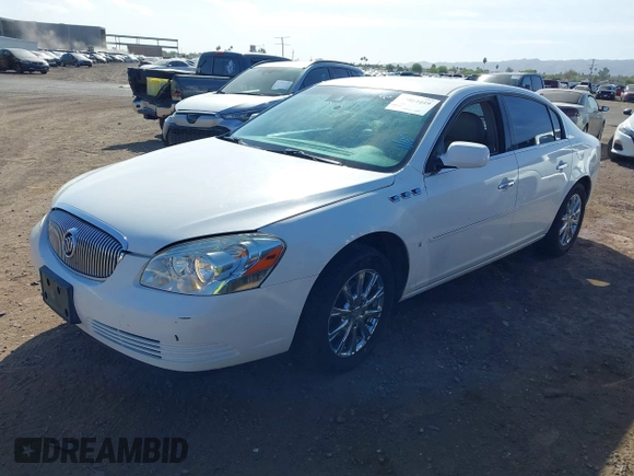2009 Buick Lucerne CXL with VIN 1G4HD57M19U109257, listed as a IAAI auction lot 42064449 with 153,665 mi miles. Bid and sale history available at carsss.com. Image 2.