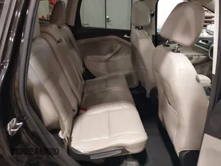 2017 Ford Escape SE with VIN 1FMCU9G98HUD67920, listed as a IAAI auction lot 40937291 with 124,302 mi miles. Bid and sale history available at carsss.com. Image 8.
