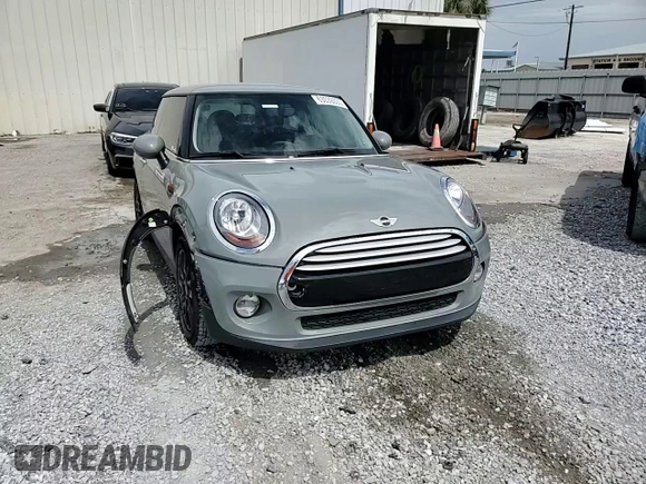 2014 MINI Hardtop with VIN WMWXM5C51ET934047, listed as a Copart auction lot 63039335 with 104,446 mi miles and Salvage title. Bid and sale history available at DreamBid. Image 15.
