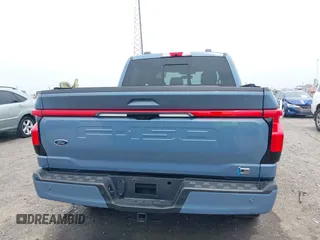 2023 Ford F-150 Lightning Pro with VIN 1FT6W1EVXPWG53591, listed as a IAAI auction lot 42249385 with 17,892 mi miles and . Bid and sale history available at DreamBid. Image 16.