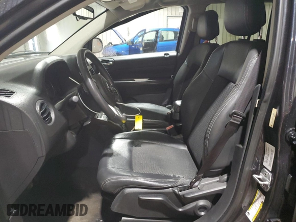 2014 Jeep Compass High Altitude with VIN 1C4NJCEA1ED531388, listed as a Copart auction lot 48048705 with 118,587 mi miles and Salvage Title. Bid and sale history available at carsss.com. Image 7.