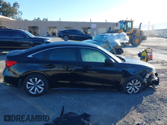 2022 Honda Civic LX z VIN 2HGFE2F29NH580563, wystawiony jako IAAI lot #41861920 z przebiegiem 15 559 mil mil oraz . Historia ofert i sprzedaży dostępna na DreamBid. Obrazek 14.