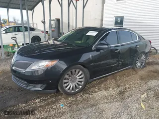 2013 Lincoln MKS with VIN 1LNHL9EK3DG616227, listed as a IAAI auction lot 40954777 with 85,810 mi miles. Bid and sale history available at carsss.com. Image 2.