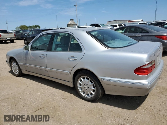 2002 Mercedes-Benz E-Class with VIN WDBJF82J92X065591, listed as a Copart auction lot 65841964 with 155,195 mi miles and Salvage Title. Bid and sale history available at carsss.com. Image 2.