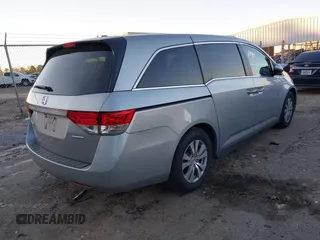2017 Honda Odyssey SE with VIN 5FNRL5H38HB020908, listed as a IAAI auction lot 41239727 with 112,316 mi miles and . Bid and sale history available at carsss.com. Image 4.