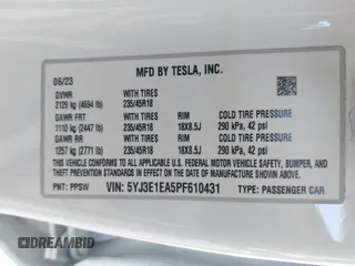 2023 Tesla Model 3 with VIN 5YJ3E1EA5PF610431, listed as a IAAI auction lot 42087181 with 19,777 mi miles and . Bid and sale history available at carsss.com. Image 9.