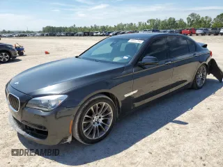 2015 BMW 7 Series 740Li xDrive with VIN WBAYF4C58FGS99363, listed as a Copart auction lot 69837154 with 115,101 mi miles and Salvage Title. Bid and sale history available at carsss.com. Image 1.