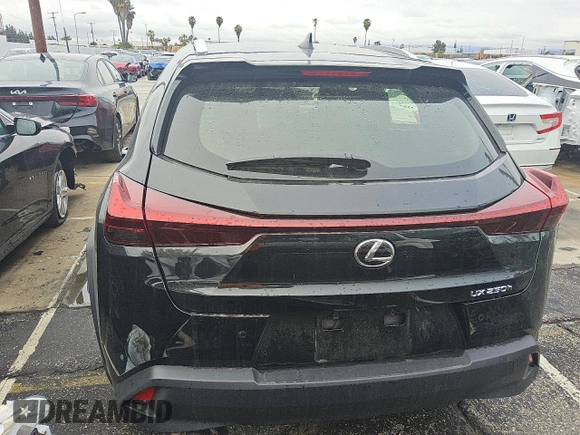2024 Lexus UX with VIN JTHX6JBH6R2189274, listed as a Copart auction lot 43121085 with 999,999 mi miles and Clean Title. Bid and sale history available at carsss.com. Image 6.